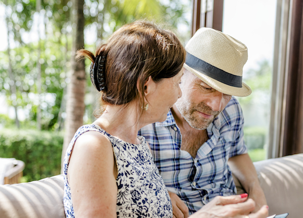 Couple waiting in a hotel lobby