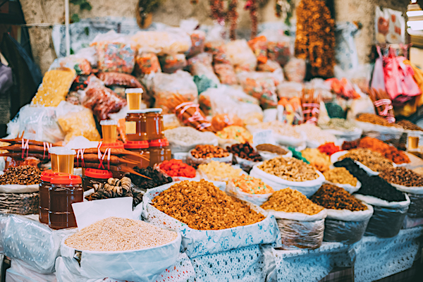 Tbilisi, Georgia. Market Bazar Abundant Counter Of Dried Fruit And Jars Of Honey On Sale.